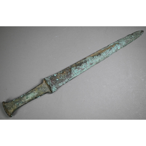 1103 - A Bronze Age (probably Iran) dagger, the tapering two-edge blade engraved with cruciform symbols and... 