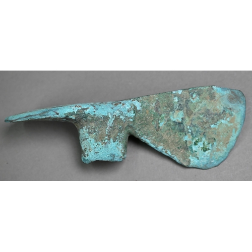 1105 - A Bronze Age (probably Luristan) axe-head of mattock form, 16 cm long