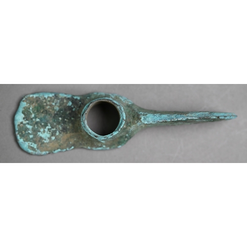 1105 - A Bronze Age (probably Luristan) axe-head of mattock form, 16 cm long