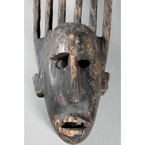 1115 - A 20th century African Lukwakongo 'passport' mask, Lega Bwani society, Dominican Republic of Congo, ... 