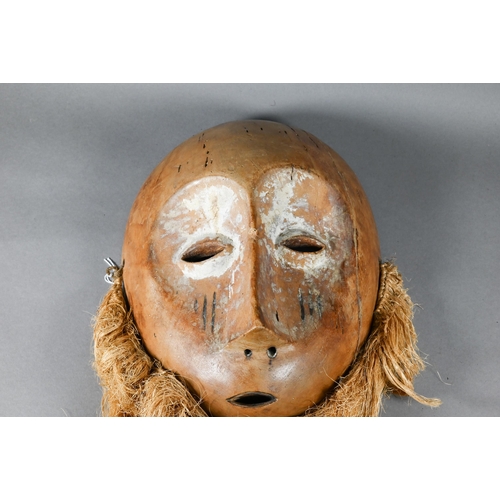 1115 - A 20th century African Lukwakongo 'passport' mask, Lega Bwani society, Dominican Republic of Congo, ... 