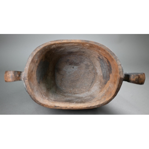 1117 - A Polynesian (possibly Solomon Islands) carved and painted wood two-handled vessel inlaid with mothe... 