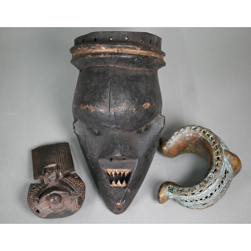 1121 - An antique African (probably Congo) tribal mask, with shapened teeth and pronounced forehead bulge, ... 