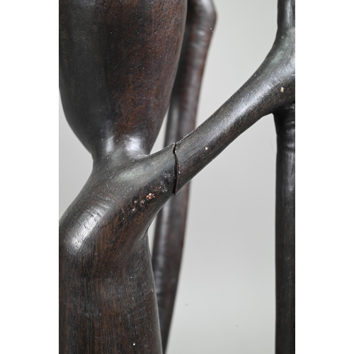 1122 - Three African figural carvings, 79-35 cm