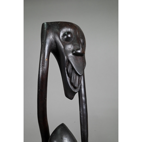 1122 - Three African figural carvings, 79-35 cm