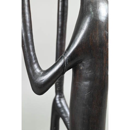 1122 - Three African figural carvings, 79-35 cm