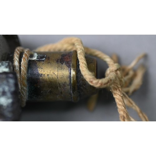 1124 - Two 19th century ornate copper and brass powder/shot flasks to/w a plain example and a leather shot-... 