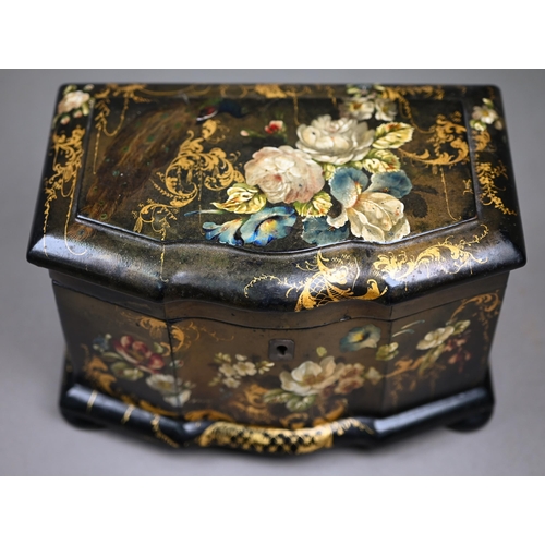 1138 - A Victorian lacquered papier maché tea caddy painted and gilded overall with flowers, on bun feet, w... 