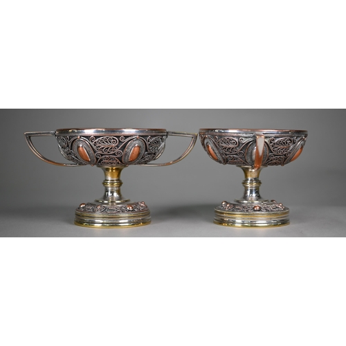 1141 - A pair of 19th century Continental plated on copper garniture vases with twin handles, wire filigree... 