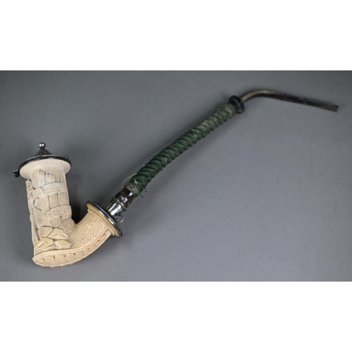 1143 - An antique German Meerschaum pipe, the bowl with ep mounts carved with a farmer smoking, 14 cm high ... 