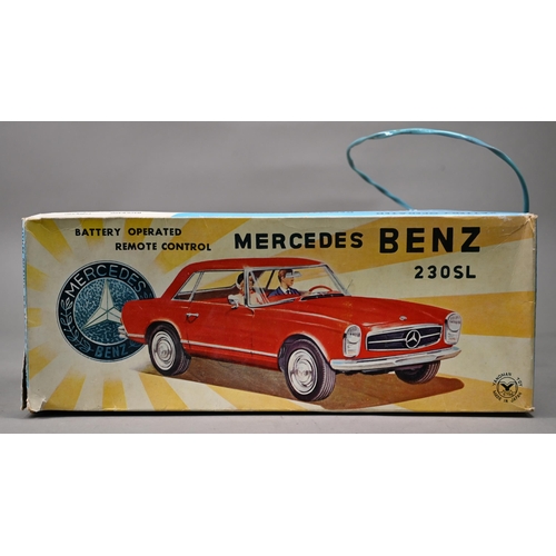 1153 - A boxed Yanoman (Japan) tinplate Mercedes Benz 230SL with remote control - battery operated, 38 cm l... 