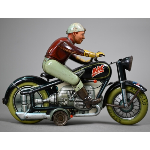 1155 - An Arnold Mac700 clockwork tinplate motorcycle with rider, 19 cm