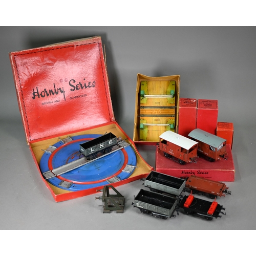 1161 - A quantity of Hornby 0 gauge rolling stock and a large quantity of track, some boxed (5 boxes)