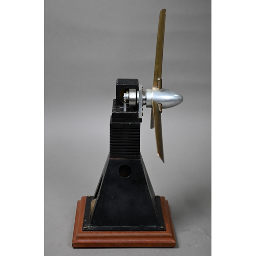 1183 - A small model Stirling engine, driving a propellor, 38cm high overall