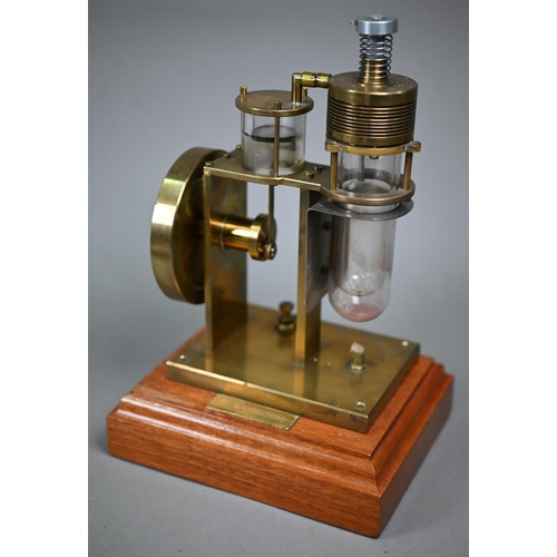 1184 - A brass model Stirling engine (made in Mexico) 28 cm high to/w a glass and aluminium Stirling engine... 