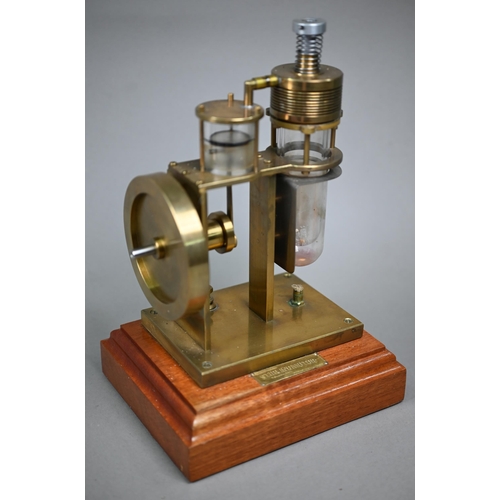 1184 - A brass model Stirling engine (made in Mexico) 28 cm high to/w a glass and aluminium Stirling engine... 