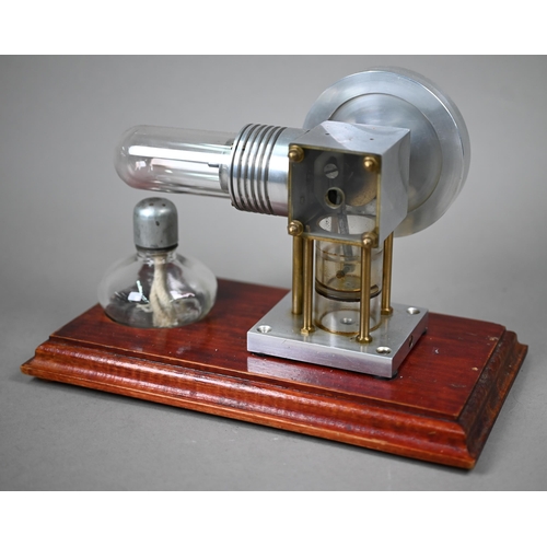 1184 - A brass model Stirling engine (made in Mexico) 28 cm high to/w a glass and aluminium Stirling engine... 