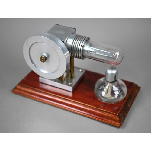 1184 - A brass model Stirling engine (made in Mexico) 28 cm high to/w a glass and aluminium Stirling engine... 