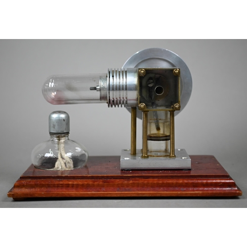 1184 - A brass model Stirling engine (made in Mexico) 28 cm high to/w a glass and aluminium Stirling engine... 