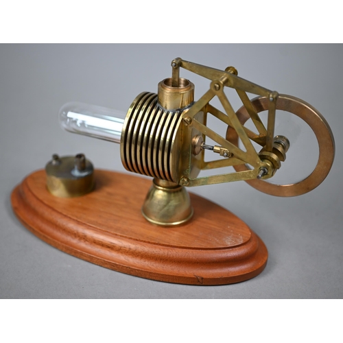 1185 - Two brass and glass model Stirling engines 33/25 cm wide to/w an oil can/burner (3)