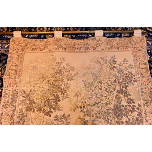 1202 - A vintage Renaissance style tapestry wall-hanging, centred by a deer-stalking party in a pastoral va... 