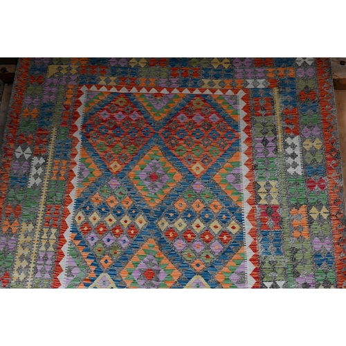 1212 - A contemporary Turkish Anatolian multi-coloured geometric design Kelim carpet, 301 x 207 cm