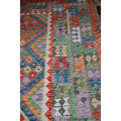 1212 - A contemporary Turkish Anatolian multi-coloured geometric design Kelim carpet, 301 x 207 cm