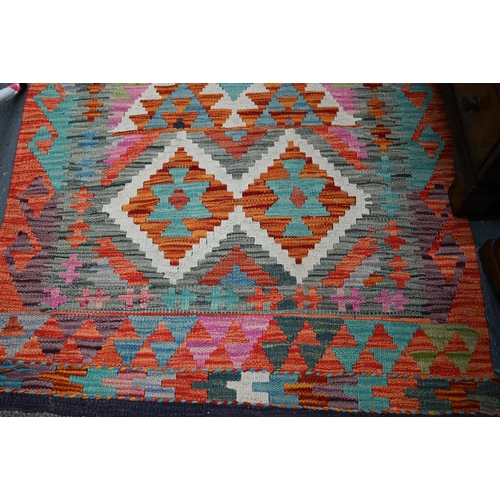 1220 - A contemporary Turkish Anatolian multi-coloured geometric design Kelim runner, 288 x 81 cm