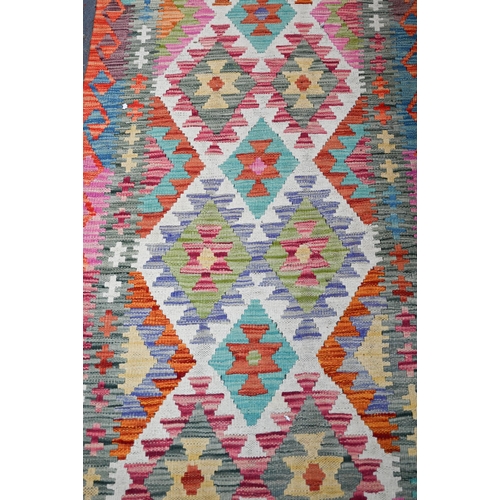 1220 - A contemporary Turkish Anatolian multi-coloured geometric design Kelim runner, 288 x 81 cm