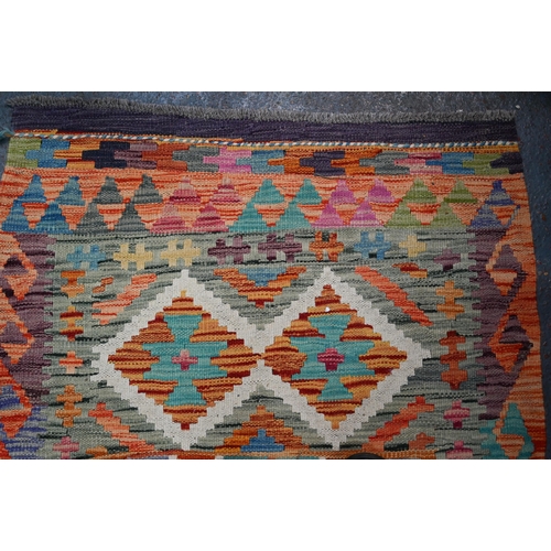 1220 - A contemporary Turkish Anatolian multi-coloured geometric design Kelim runner, 288 x 81 cm