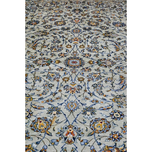 1226 - A Central Persian signed Kashan carpet, pale celadon ground with well-executed floral vine design, 4... 