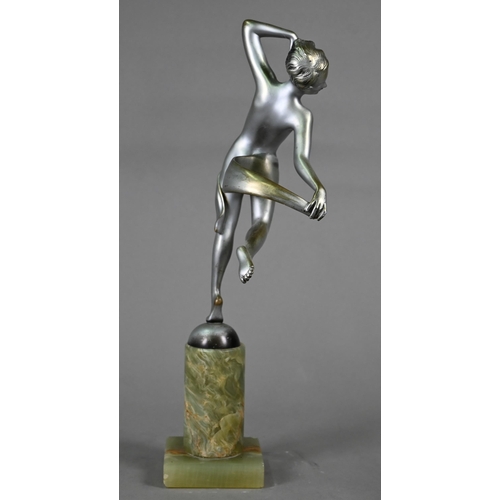 1254 - An Art Deco silver-patinated figure of a female nude dancer, after Josef Lorenzl (signed), on onyx b... 