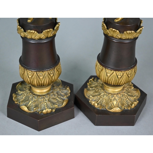 1260 - A pair of continental bronzed and ormolu four-sconce candelabra with figural pillars, 59 cm high o/a... 