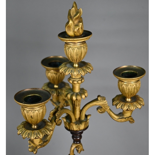 1260 - A pair of continental bronzed and ormolu four-sconce candelabra with figural pillars, 59 cm high o/a... 