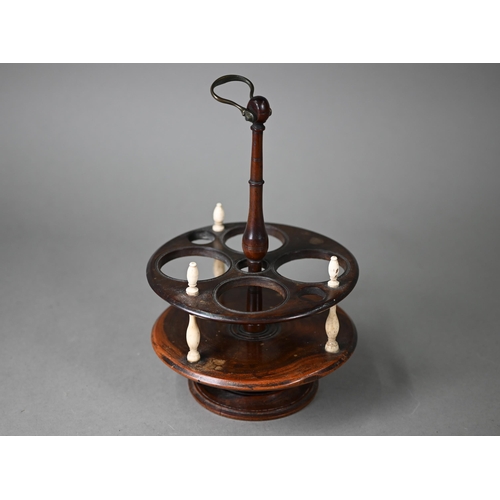 1264 - A 19th century turned wood (possibly laburnum) cruet stand with bone pillars, 25 cm high o/a