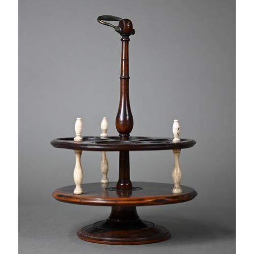 1264 - A 19th century turned wood (possibly laburnum) cruet stand with bone pillars, 25 cm high o/a