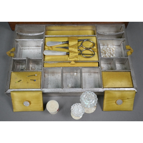 1265 - A Victorian rosewood work-box, the interior with mother of pearl fittings and yellow silk padded cov... 