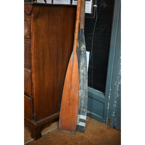 1268 - An Oriel College oar, painted for 'Torpid' 1932, 360 cm to/w an undecorated oar, 295 cm and a relate... 