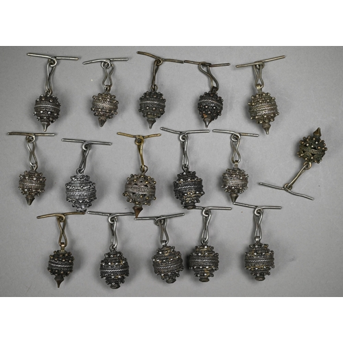 1273 - A collection of sixteen Serbian/Dalmatian white metal military uniform buttons of globular filigree ... 