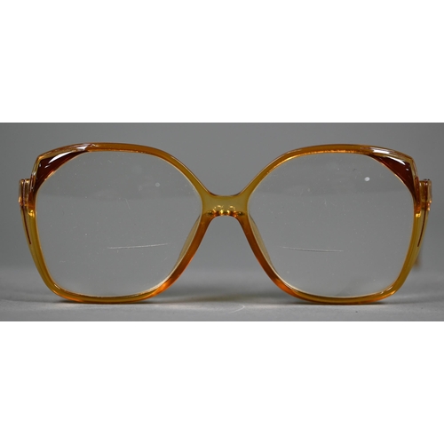 1276 - A pair of Christian Dior amber-coloured framed sunglasses with bi-focal lenses