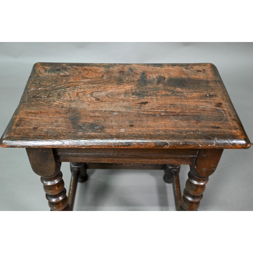 846 - A 17th century style elm seat joint stool, with turned supports, 45 cm x 27 cm x 49 cm h