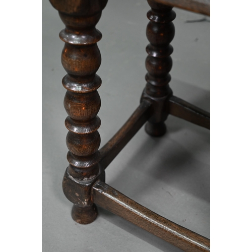 846 - A 17th century style elm seat joint stool, with turned supports, 45 cm x 27 cm x 49 cm h