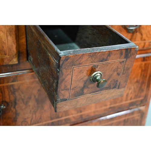 855 - An early 18th century walnut chest of three short over three long graduated drawers, raised on shape... 