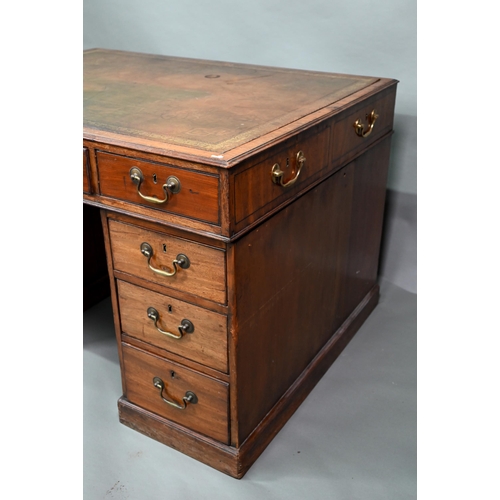 860 - A Victorian mahogany partner's desk, the gilt tooled green leather inset top over a trio of frieze d... 