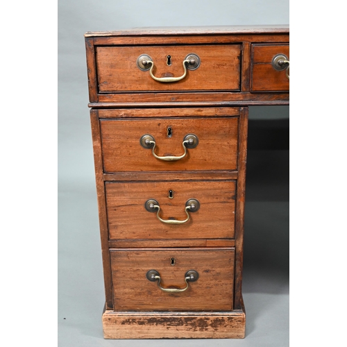 860 - A Victorian mahogany partner's desk, the gilt tooled green leather inset top over a trio of frieze d... 