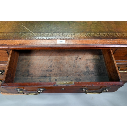 860 - A Victorian mahogany partner's desk, the gilt tooled green leather inset top over a trio of frieze d... 