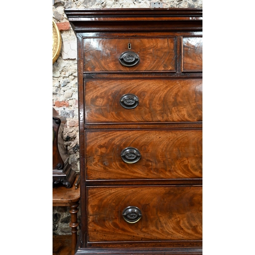 863 - A Georgian figured mahogany chest on chest, three short drawers oven six long graduated  drawer... 