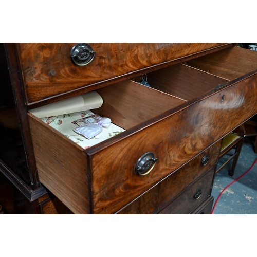 863 - A Georgian figured mahogany chest on chest, three short drawers oven six long graduated  drawer... 