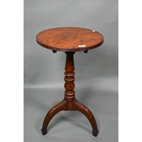 864 - A 19th century pollard oak tripod kettle table, the circular top with reeded edge raised on a ring t... 