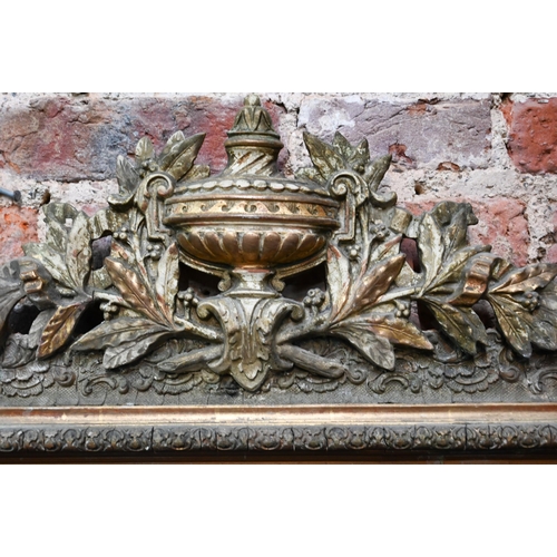 867 - An antique French gilt gesso mirror, surmounted by a garland festooned urn, 155 cm h x 102 cm